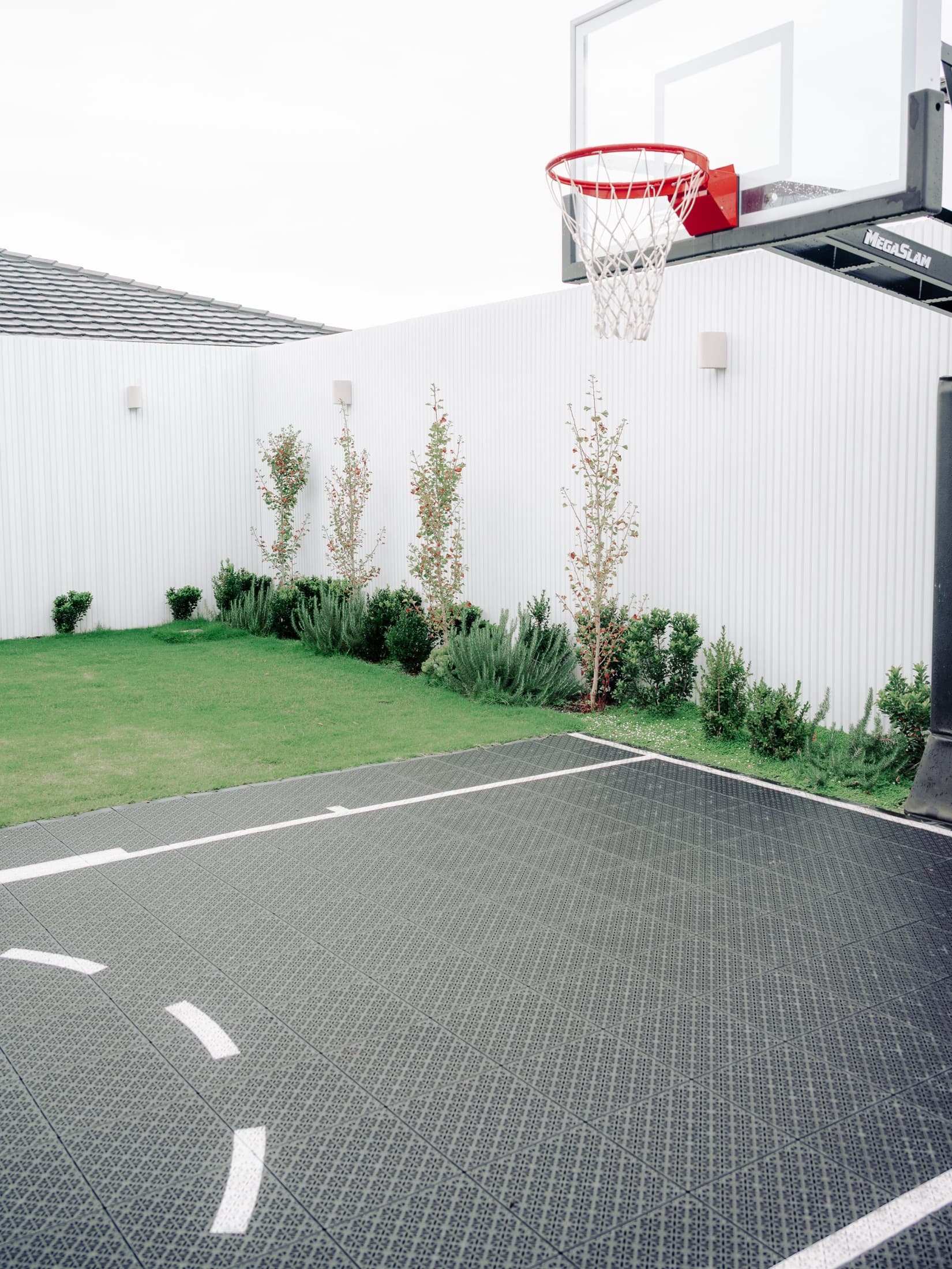 Court and landscaped surrounds in the Clyde North backyard project