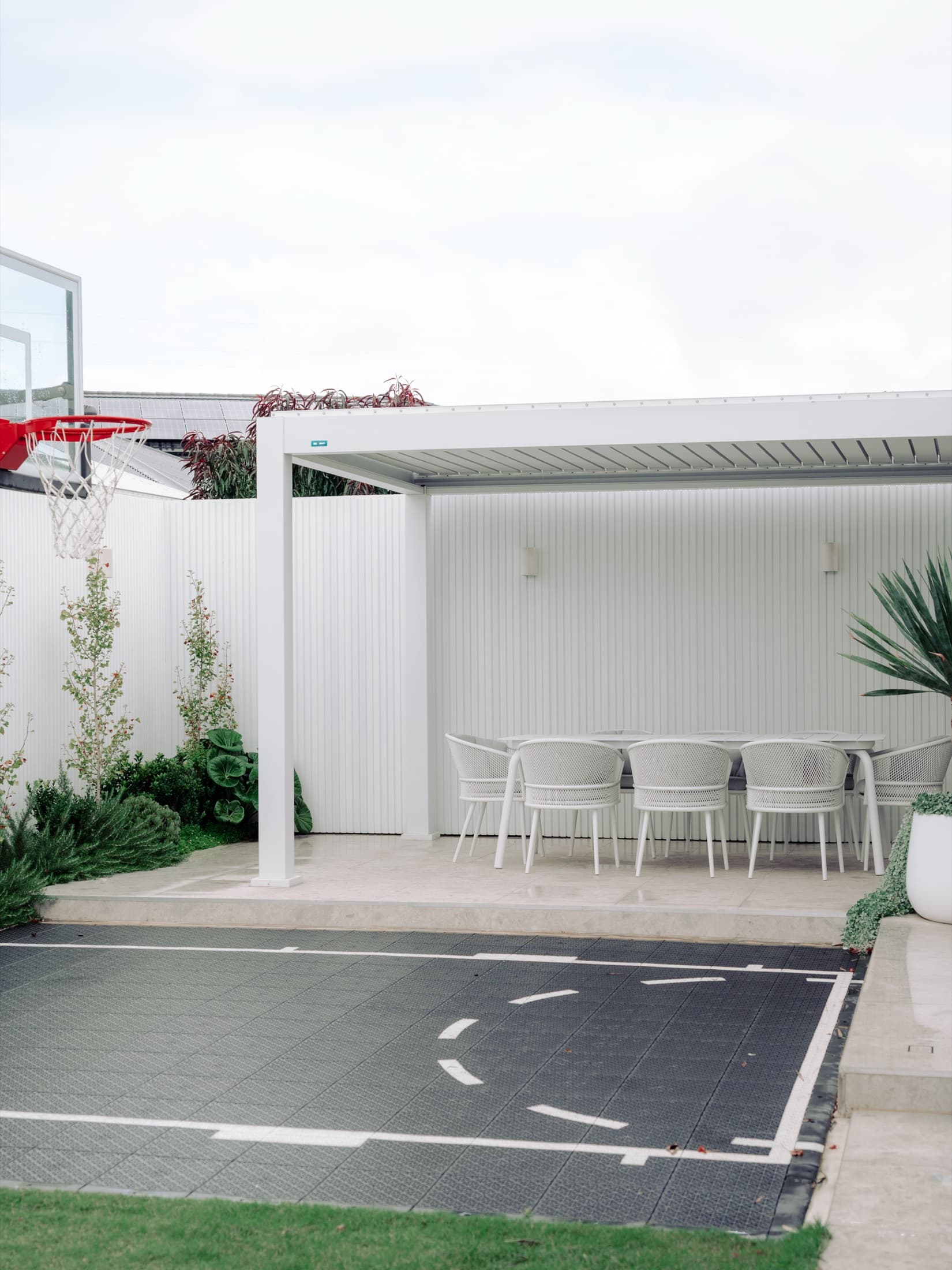 Connected outdoor zones and planting in a completed Clyde North backyard